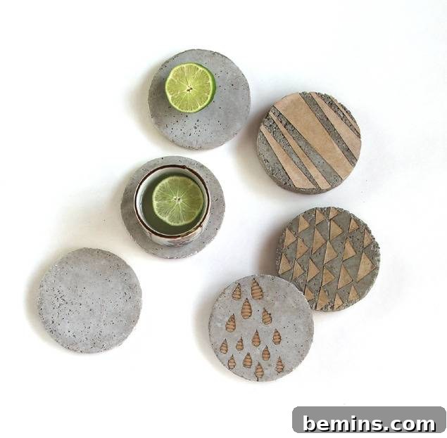 A set of concrete coasters with colorful decorative inserts