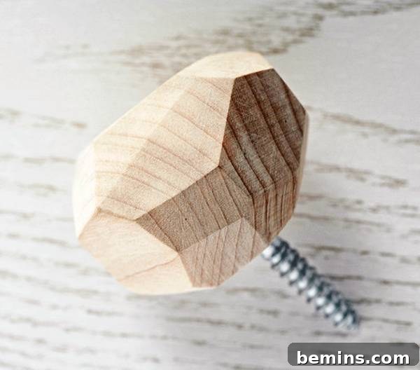 Small screw with a wooden head used to create wall hooks.