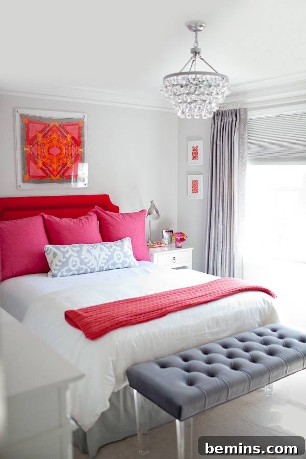 Pink Power: 16 Dreamy Bedrooms for the Bold at Heart 7 White color bedroom with pink bed, blanket, and pillows and pink wall frame on the wall.