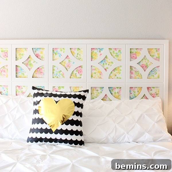 Unique DIY Headboard Designs to Reinvent Your Bedroom 9 Black and White cushion with heart is on the bed.