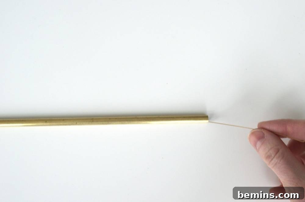 DIY Geometric Brass Pendant Light Fixture 2 Run wire through copper piping.
