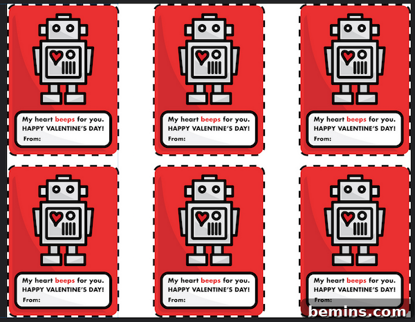 Valentines Day cards with robots are set out in rows.
