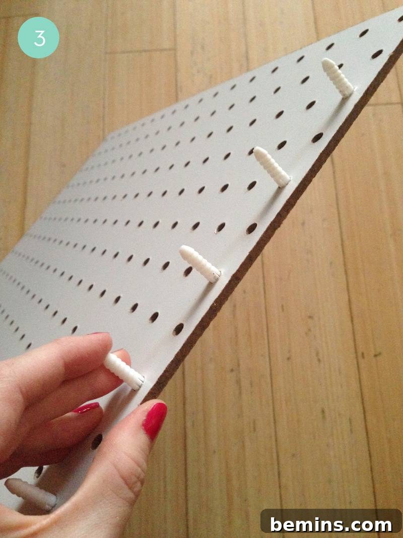 Adding Drywall Anchors to Pegboard