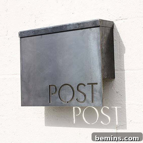 Raw steel mailbox with a unique design by Jonathan Duke of BoldMFG.