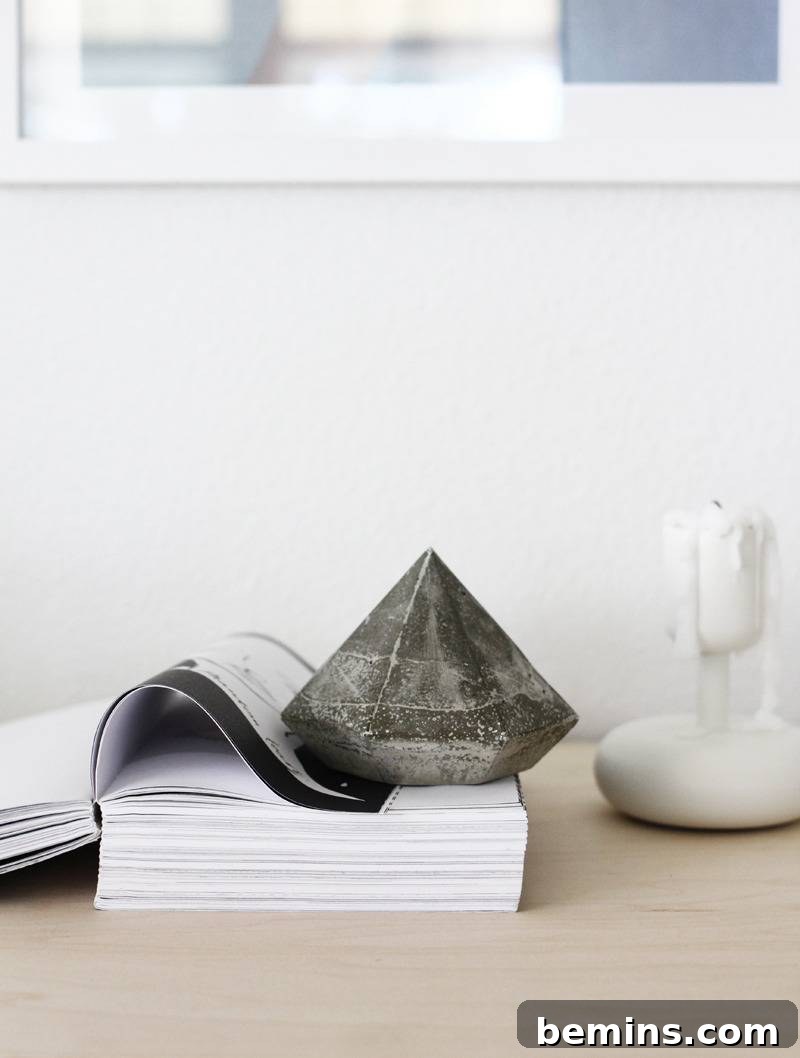 A white desk with books and office accessories