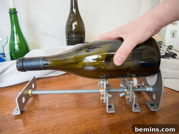 Which Bottle Cutter Reigns Supreme? A Definitive Review 22 Holding a wine bottle over the Bindu bottle cutter.