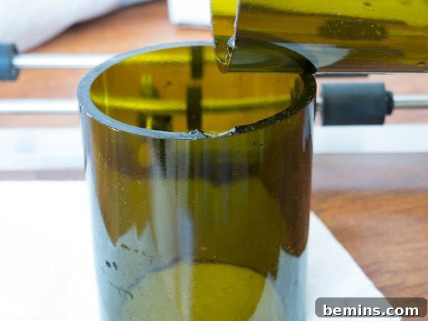 Which Bottle Cutter Reigns Supreme? A Definitive Review 42 Cut wine bottle base resting on another cut wine bottle base.