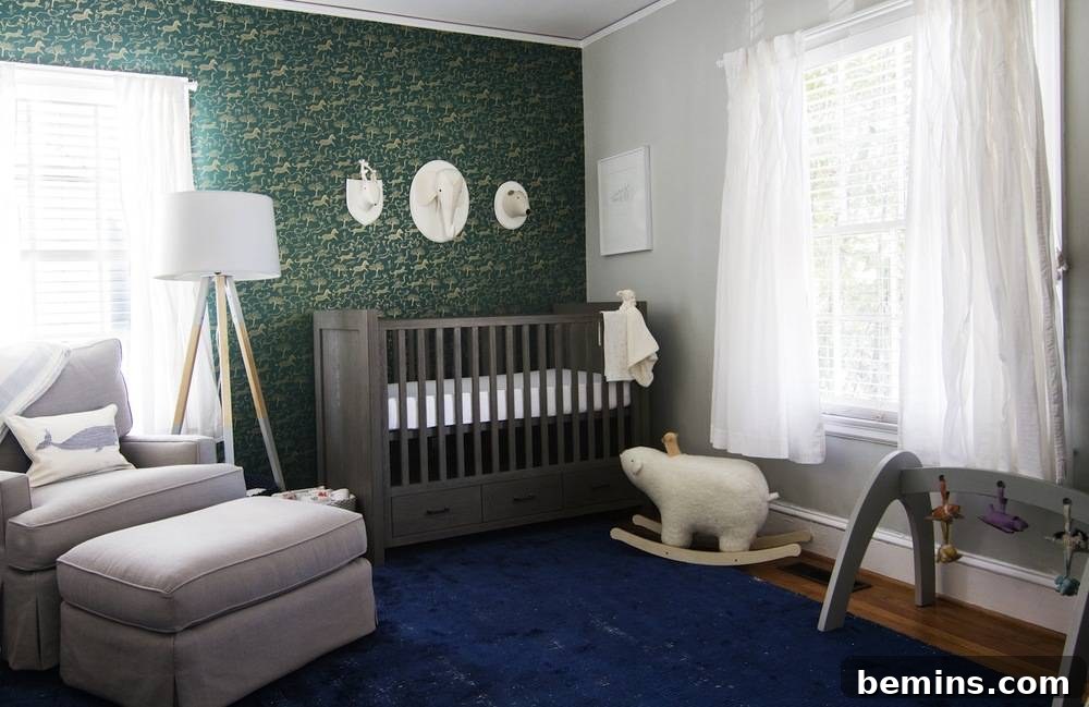 A vibrant and inviting nursery room featuring a striking hunter green wall, complemented by a soft blue carpet, creating a calming yet playful atmosphere for a baby boy.