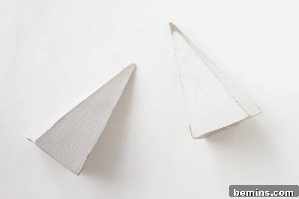 DIY Geometric Concrete Bookends from Recycled Cardboard 14 White geometric bookends.