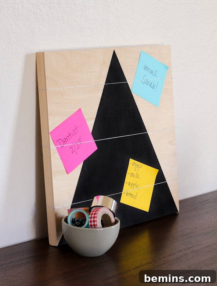 Simple Chic Wood Memo Board 6 Completed DIY memo board holding various notes and reminders