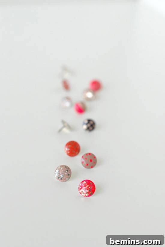 Decorative Thumbtacks Displayed on a Corkboard