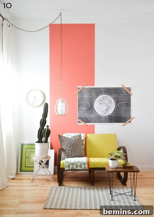 Pastel room with chairs, table, wall art, potted plant, and wall clock.