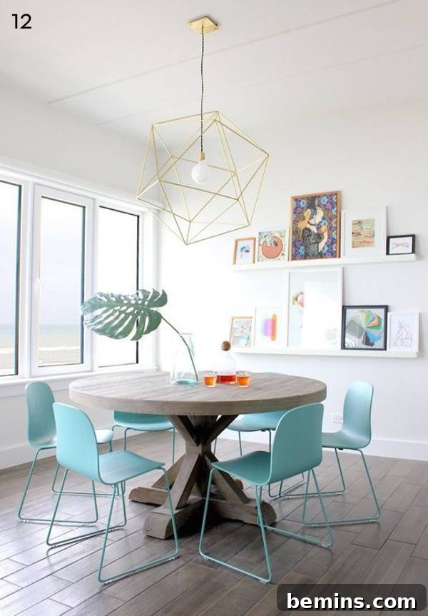 Dining room with blue chairs and photo frames.