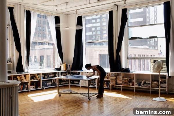 A large design studio with big windows. Shirin Neshat's workspace emphasizes light and space.
