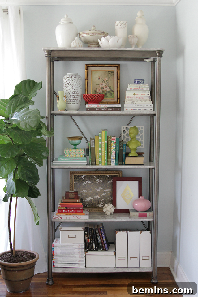 Styling Your Bookshelf: A Design Guide 3 Varying Scale on a Bookshelf