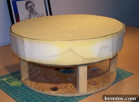 Upcycled Wooden Spool Ottoman in Light Green 4 Stool with cardboard attached