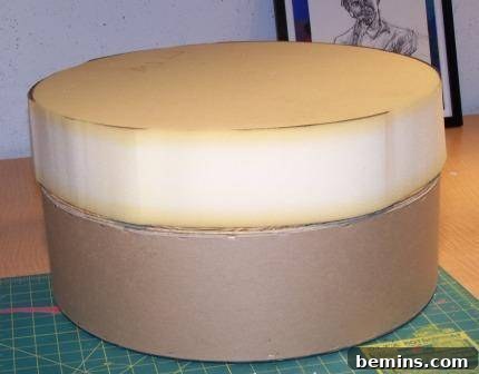 Upcycled Wooden Spool Ottoman in Light Green 5 Ottoman body covered with batting