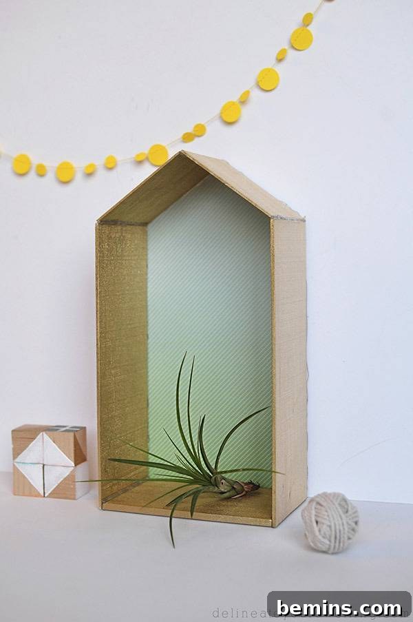 A charming DIY balsa wood house adding a whimsical and decorative touch to a room.