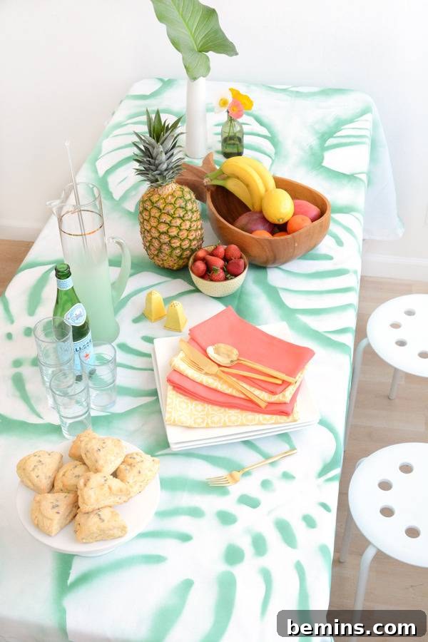 DIY Tropical Leaf Tablecloth Project 5 A close-up of the tropical leaf tablecloth with a bowl of fresh fruit.
