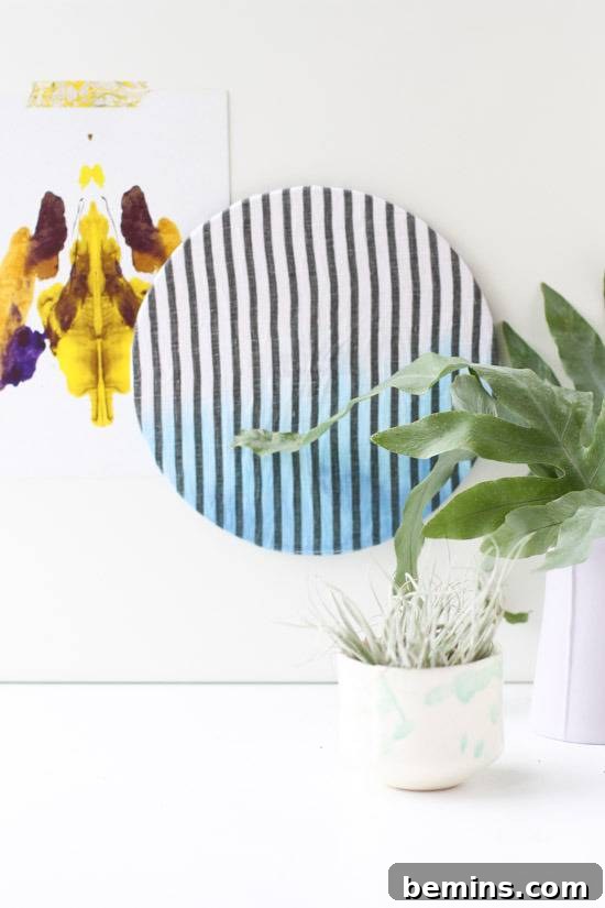 Crafting Cork Creations: Simple Art with Plant Mats 8 Cork plant mat with stripes and potted plants on the table, demonstrating a stylish home decor application.