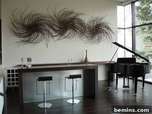 A stunning abstract twig art installation displayed in a dining area, showcasing intricate patterns and textures that create a visually captivating centerpiece.
