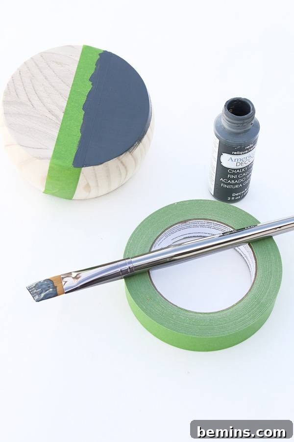 Painting the wood bun foot with acrylic paint