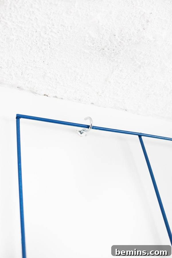 Hanging the Wire Mesh Plant Holder onto Eye Hooks