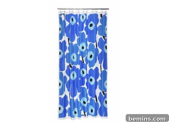 Shower curtain with blue colored flowers, showcasing Marimekko Unikko design