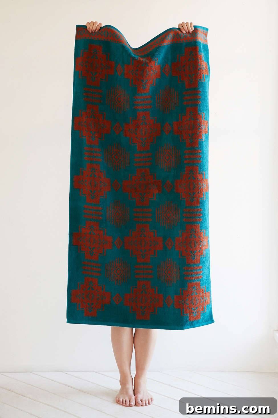 Person holding a red and blue Pendleton Bathroom Towel
