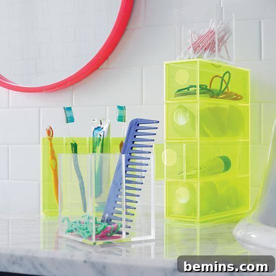 Yellow Lucite container holding bathroom accessories