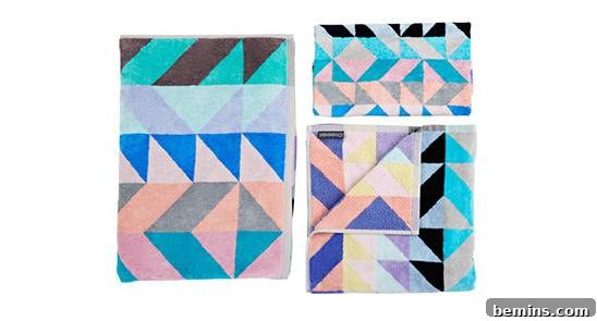 Three quilts with light colored geometric patterns, showcasing Ninnho Towel Set
