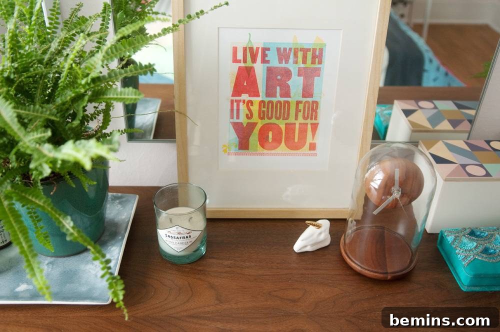 A wooden desk adorned with decorative items and plants.