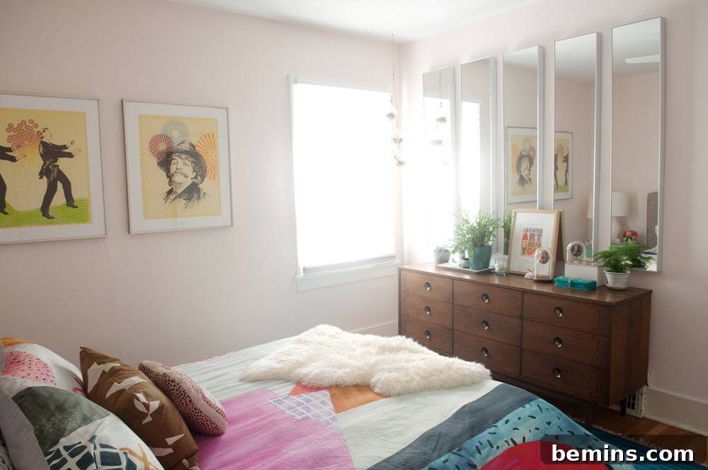 A brightly lit and colorful master bedroom with mirrors and a cozy atmosphere.