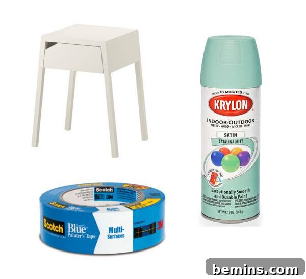 Revamped Radiance: A Nightstand's Bold Transformation 3 Blue tape and a can of spray paint next to a small white table.