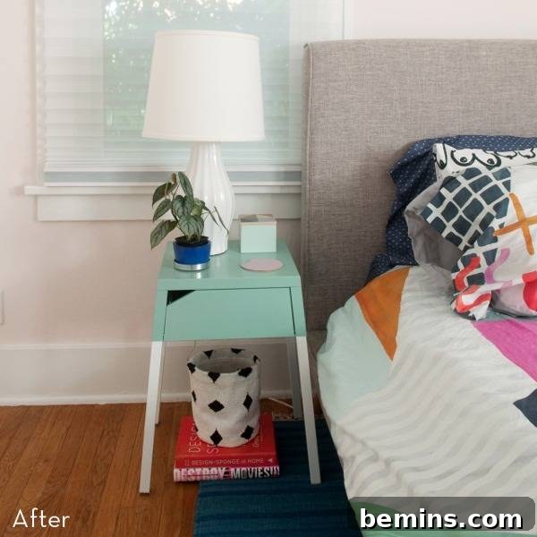 Revamped Radiance: A Nightstand's Bold Transformation 4 Night stand with table lamp, potted plant at the top and books and bag under the table and bed aside.