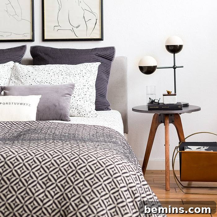 A bedroom scene showcasing a bed with a differently styled upholstered headboard, demonstrating fabric versatility.