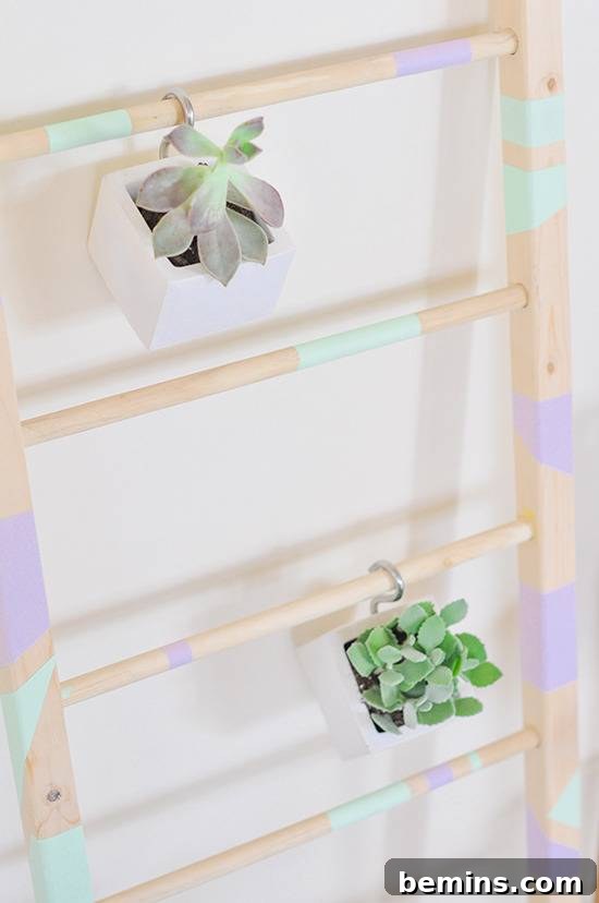 DIY Vertical Succulent Garden from an Old Ladder 19 DIY Ladder Garden with Hanging Succulents
