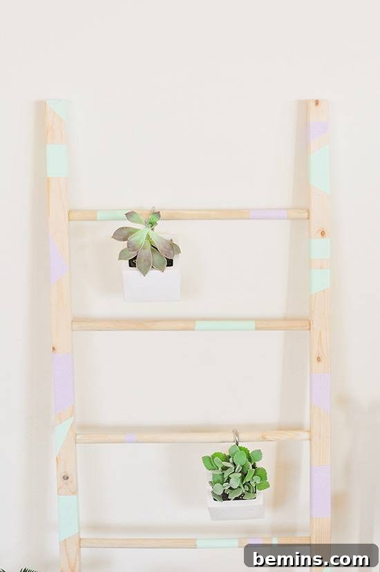 DIY Vertical Succulent Garden from an Old Ladder 23 DIY Ladder Garden with Hanging Succulents