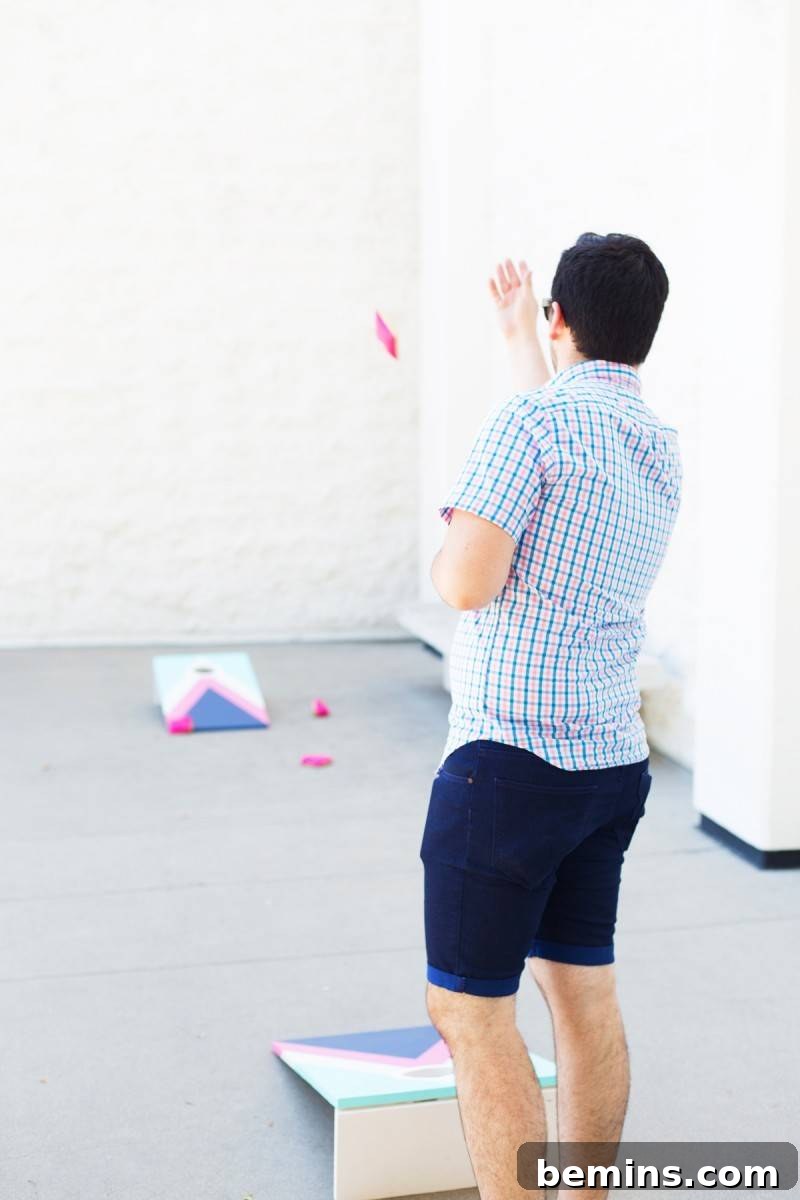 Crafting the Perfect DIY Summer Bash 7 Playing Cornhole at a Summer Party
