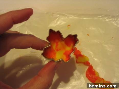 Candy corn fondant preparation for decoration using simple tools.