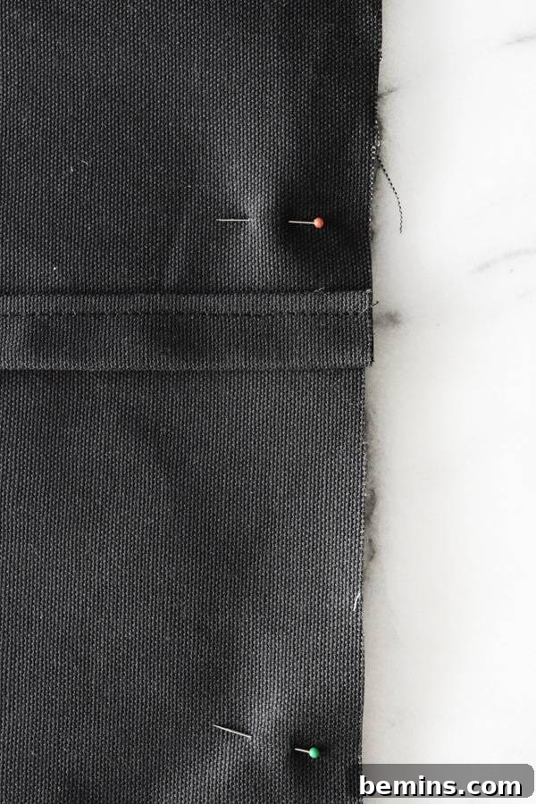 Colored dot ball headpins in the black cloth.