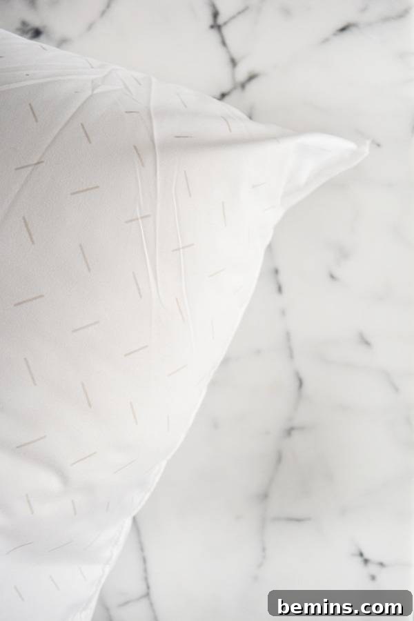 a beautiful white comfortable bed for the pets