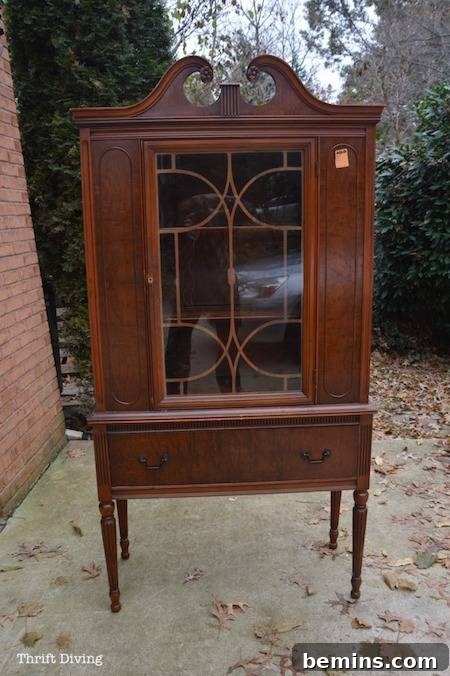 A mini wooden cabinet with an outdoor aesthetic.