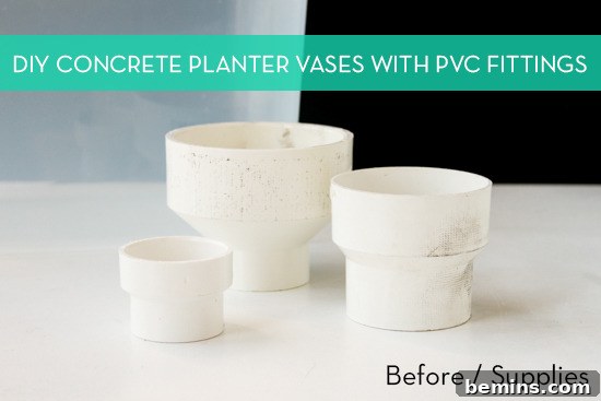 White concrete planter vases laying next to each other.