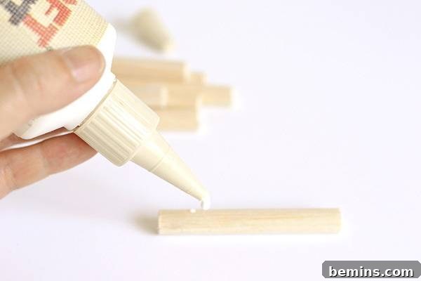Gluing dowel pieces together - close up