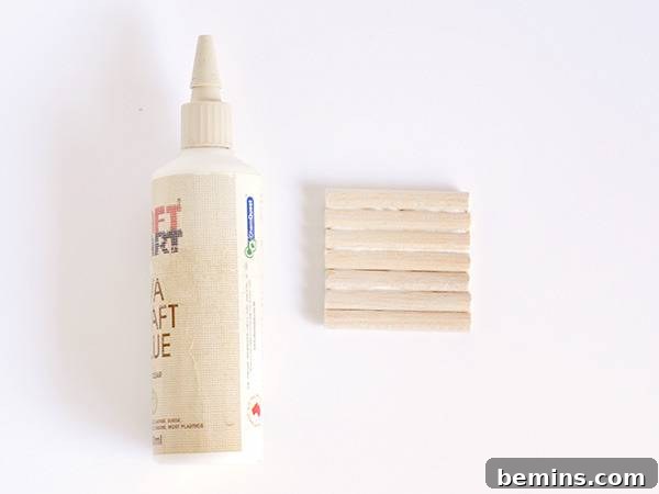 Gluing painted square to dowel base