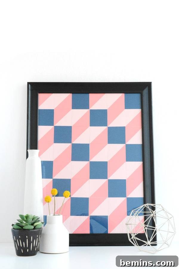 A pink and blue 3D painting is sitting in a frame.