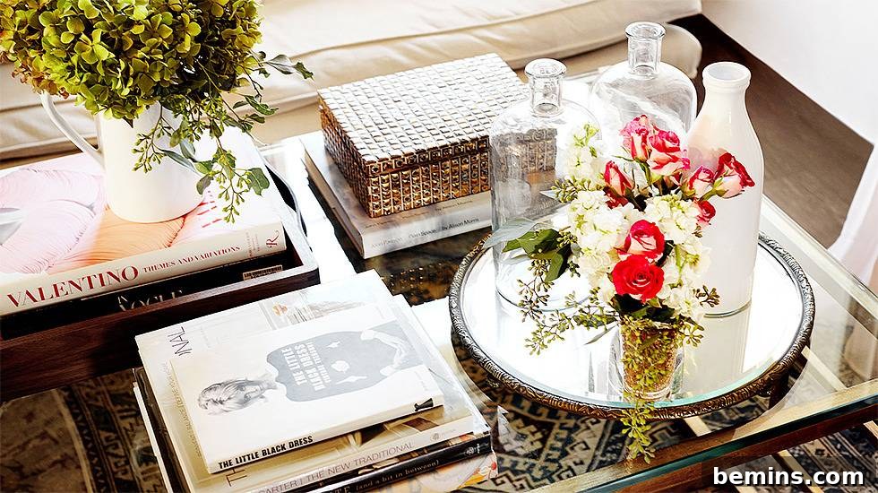 Coffee table vignette with books, trinkets, and decorative objects