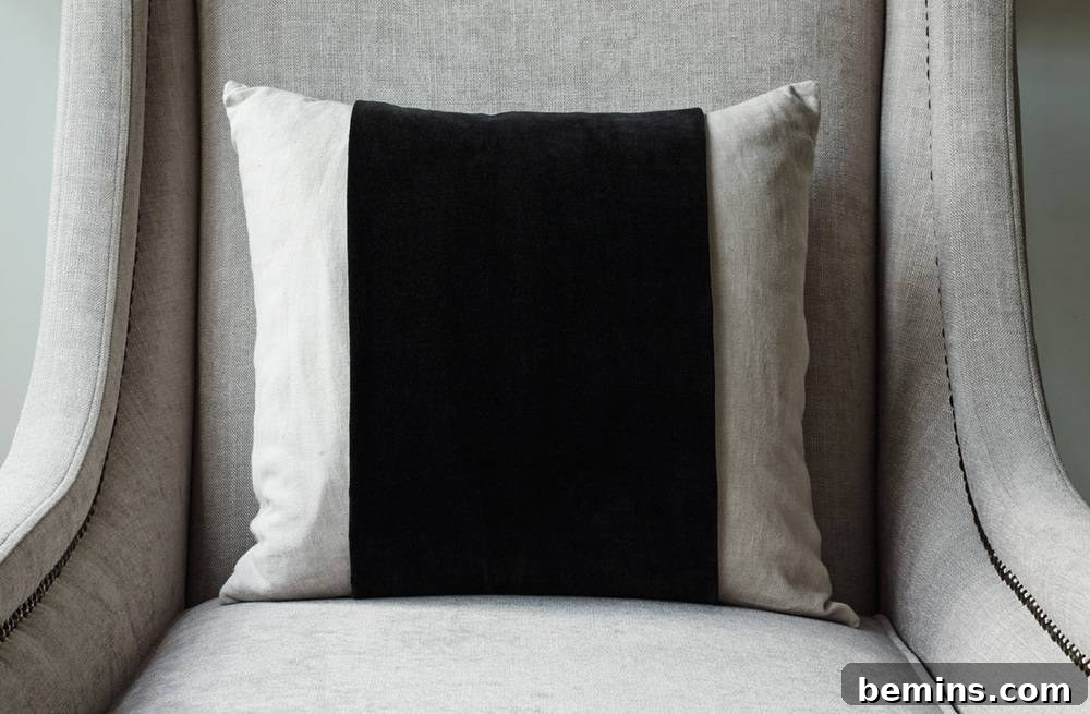 Chair with a textured throw pillow adding a luxurious feel