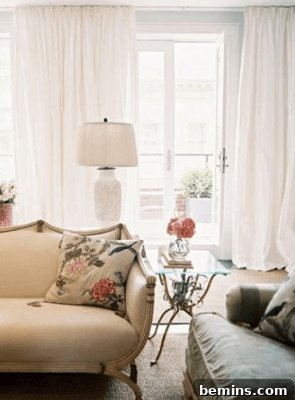 Curtains hung from floor to ceiling creating a sense of height